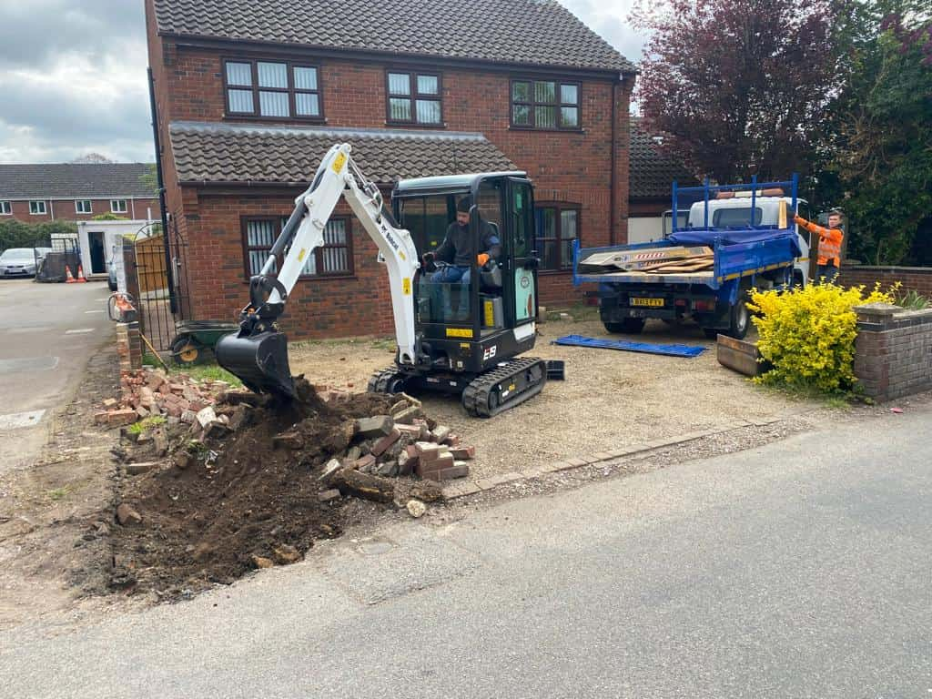 This is a photo of an operative of Paddock Wood Driveways Digging out for a new tarmac driveway