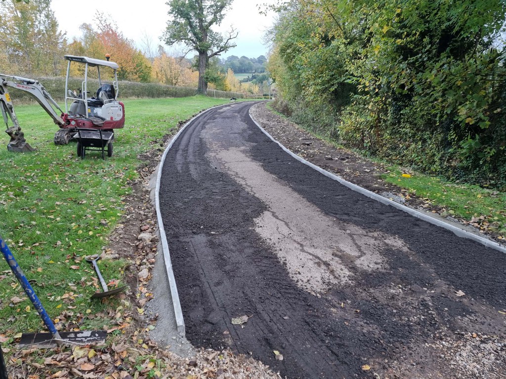 This is a large driveway which is in the process of having a tar and chip driveway installed on by Paddock Wood Driveways